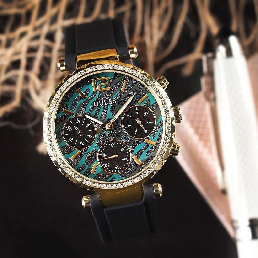 Guess GW0113L1 Solstice montre femme dorée avec cadran vert et bracelet silicone noir